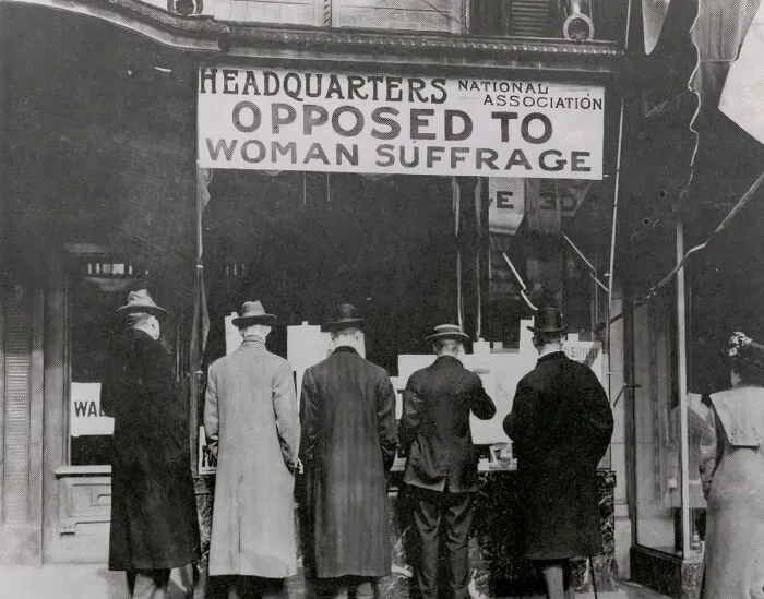 Passers-By Looking At Window Display At The Headquarters Of National Association Opposed To Woman Suffrage, CA. 1919