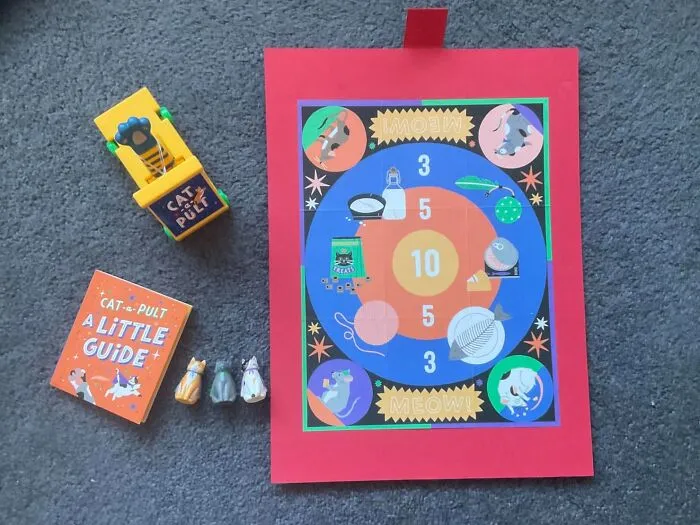 Procrastinating On Your Responsibilities Is About To Become An Officially Sanctioned Activity Now That You Can Spend Hours Launching Tiny Felines With The <a Style="Display:inline;" Href="Https://Www.amazon.com/Cat-Pult-They-Fly-Minis/Dp/076247372x?ie=utf8&linkcode=ll1&tag=bpbobcat-20&linkid=b9d77c8e01adb517317f39fa756cdaa4&language=en_us&ref_=as_li_ss_tl" Target="_blank"> <span Style="Font: Inherit; Color: #d74b1f;"> Cat-A-Pult Game </Span>