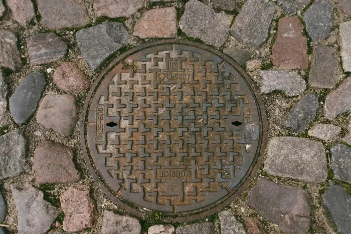 An Iron Manhole Cover - In Specific Cases 125,000 Mph (201,167 Km/H)