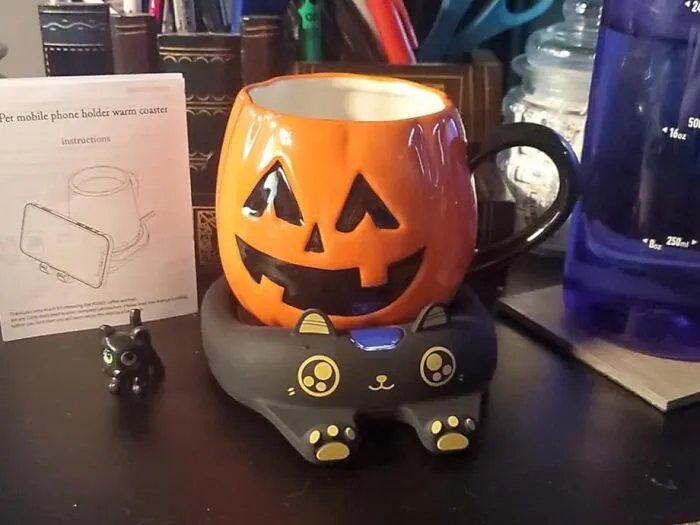The Tragic, Room-Temperature Fate That Befalls Your Morning Coffee Every Single Day Can Be Prevented By A Tiny, Heated Feline Friend, Otherwise Known As A <a Style="Display:inline;" Href="Https://Www.amazon.com/Pusee-Settings-Electric-Beverage-Adorable/Dp/B0c2hnb1mc?ie=utf8&th=1&linkcode=ll1&tag=bpbobcat-20&linkid=fcde0000abc8ad12e1873a9344200acb&language=en_us&ref_=as_li_ss_tl" Target="_blank">  <span Style="Font: Inherit; Color: #d74b1f;"> Cat Shaped Mug Warmer </Span>