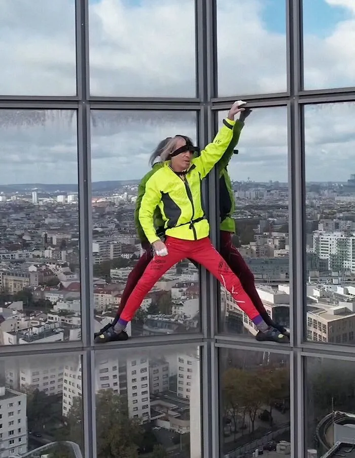Alain Robert Scales Sheer Skyscrapers Using Nothing But His Bare Hands And Feet
