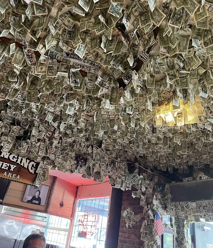 This Bar Has Over $10000 In Dollar Bills On The Ceiling