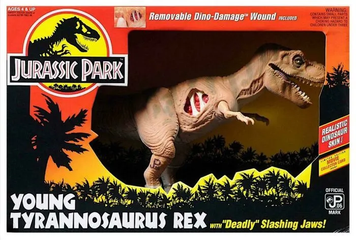 Jurassic Park 90s toy of Young Tyrannosaurus Rex with removable dino-damage wound and realistic dinosaur skin in packaging.