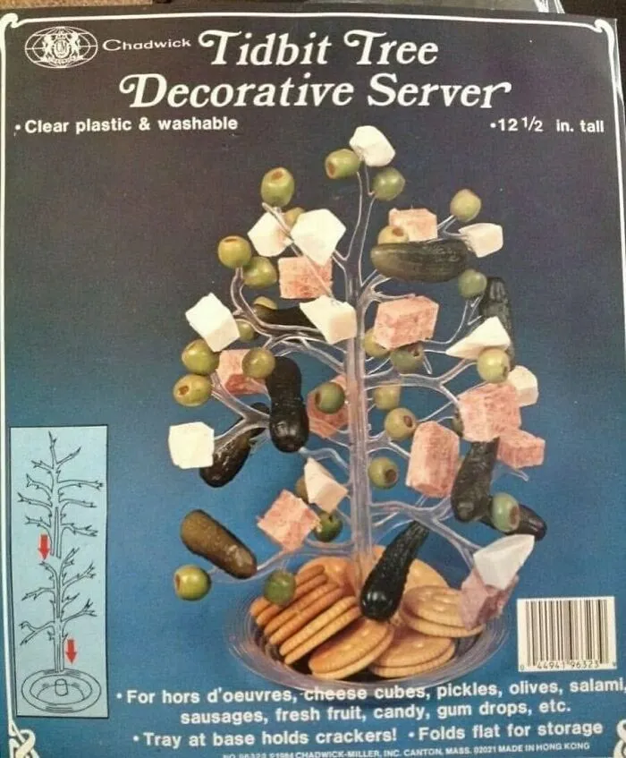 Vintage Tidbit Tree decorative server holding olives, cheese cubes, pickles, and crackers for hors d'oeuvres display.