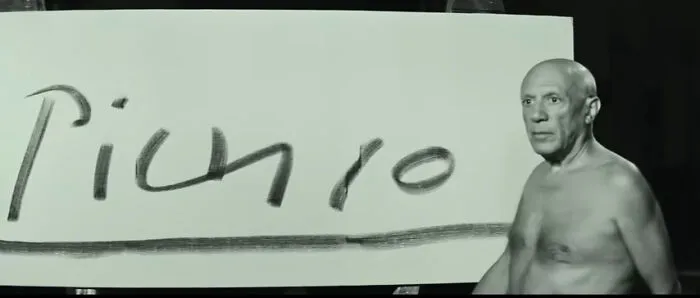 A shirtless man stands beside a board with handwritten text, illustrating concept time facts visually in a dark setting.
