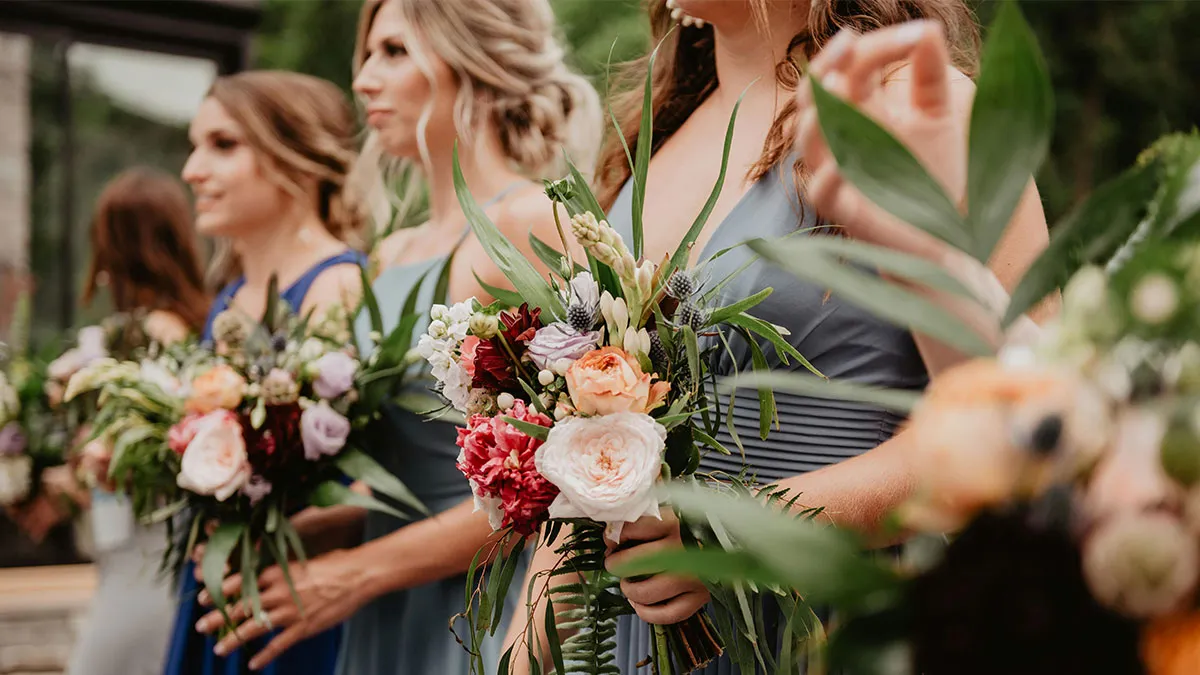 Person Sips On Their Cocktail While Observing The Circus That Their Cousin’s Wedding Turned Into
