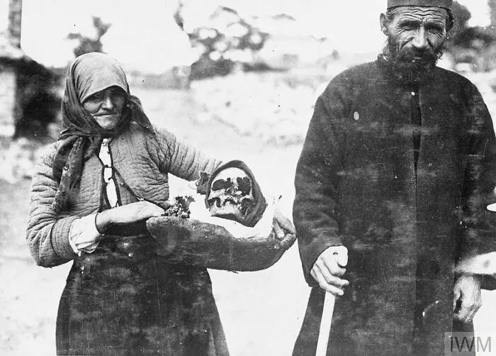 A Woman Moving To Another Village Takes With Her The Bones Of Her Dead Son