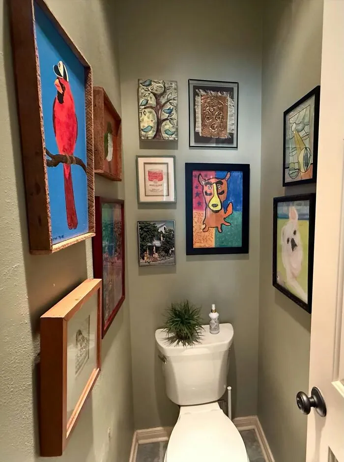 Instead Of Putting My Extra Art In Storage, I Hung It All In My Tiniest Bathroom