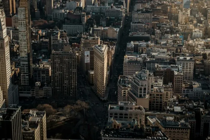 Aerial view of a dense cityscape with tall buildings and streets, illustrating safe things that people can’t stop freaking out about.