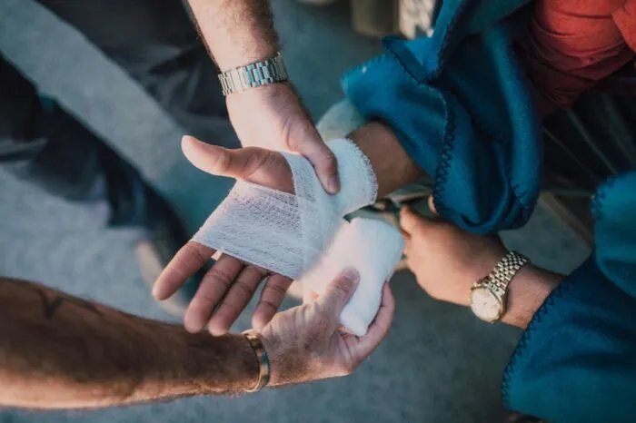 Your friend cuts their hand while cooking. Should you know how to handle it with basic first aid?