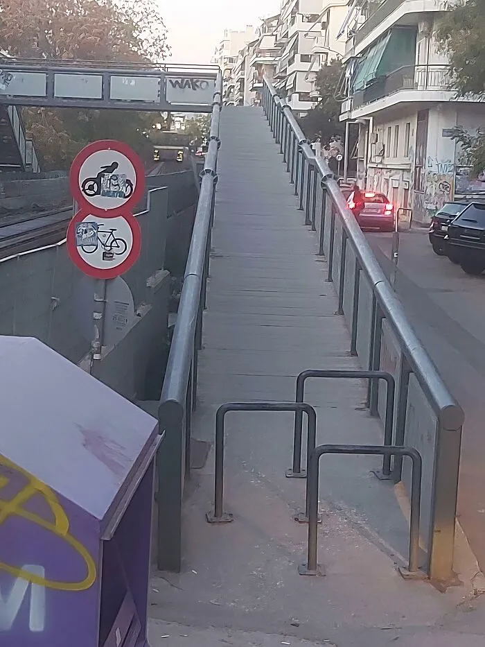 Trying To Prevent Cyclists From Using The Ramp, By Blocking The Passage To Everyone With Wheels (Strollers, Wheelchairs, Etc)