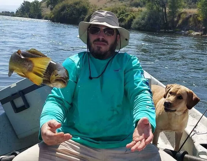 Pez, hombre, perro