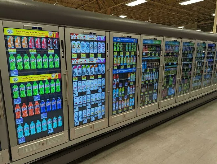 They Started Replacing The Refrigerator Doors With LED Screens At My Local Supermarket