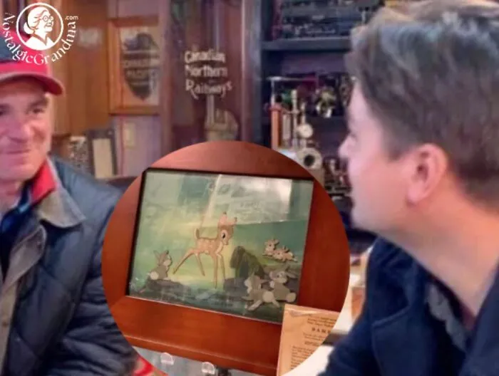 Two men smiling and talking in a cozy room, sharing heartwarming stories to cleanse negativity from the feed.