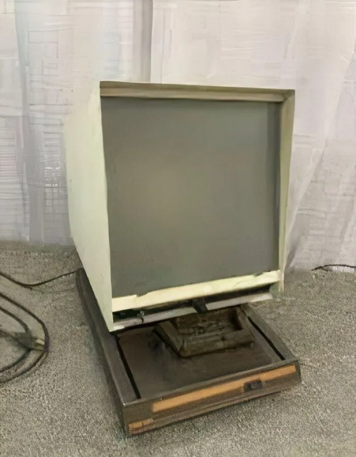 Old vintage computer monitor from the 1980s displayed on carpet, evoking nostalgic and old age memories.
