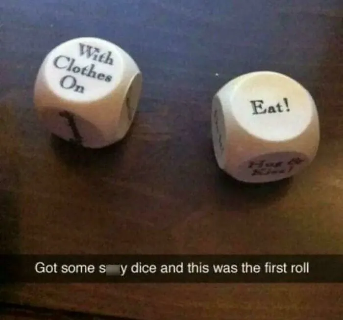 Two dice with playful and bizarre phrases on a dark surface, illustrating funny and bizarre images combining the holy and cursed.