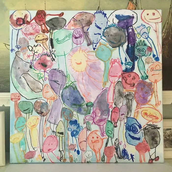 Cada vez que mi hija de 7 años, que tiene síndrome de Down, dibuja una persona, dice con lenguaje de signos que es "Papá". Los he guardado y los he plasmado en un lienzo para el Día del Padre.