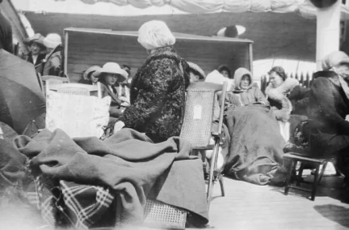Survivors Can Be Seen Wearing Borrowed Clothing