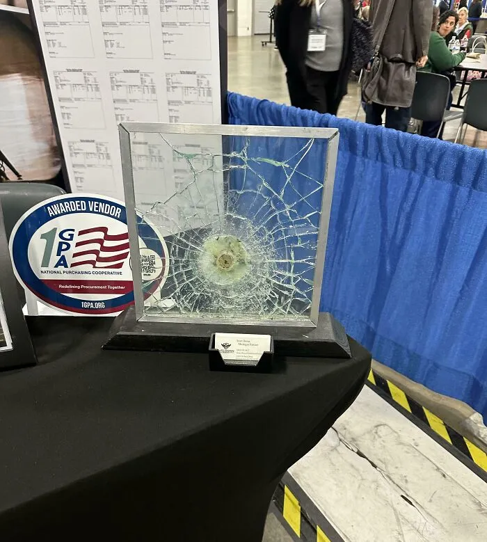 A Vendor Selling Bullet Resistant Glass To Schools At A Teacher Convention In America 10/17/2024