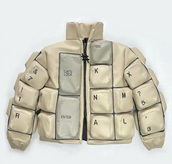 Jacket designed with oversized keyboard keys as padded sections, showcasing a unique nonsensical fashion concept.