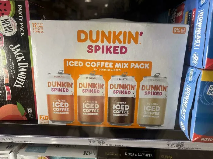 Dunkin spiked iced coffee mix pack with four flavors, a unique and nonsensical beverage product on store shelf.