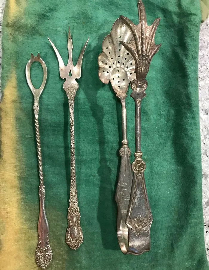 Open Spoon With Spikes; Trident-Like Fork; Tongs With A Chicken Foot And A Perforated Spoon. All Antique Silver