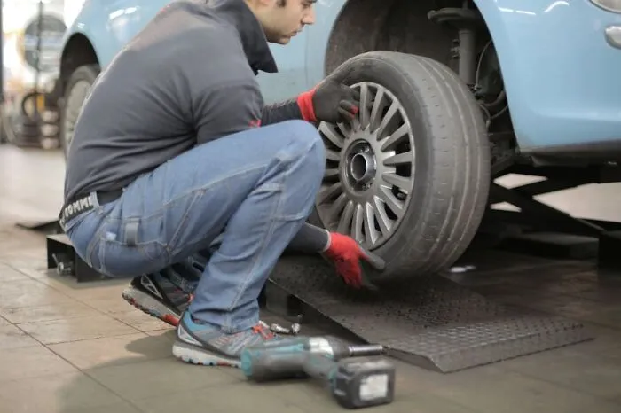 Your car gets a flat tire on the road. Is it important to know how to change it?
