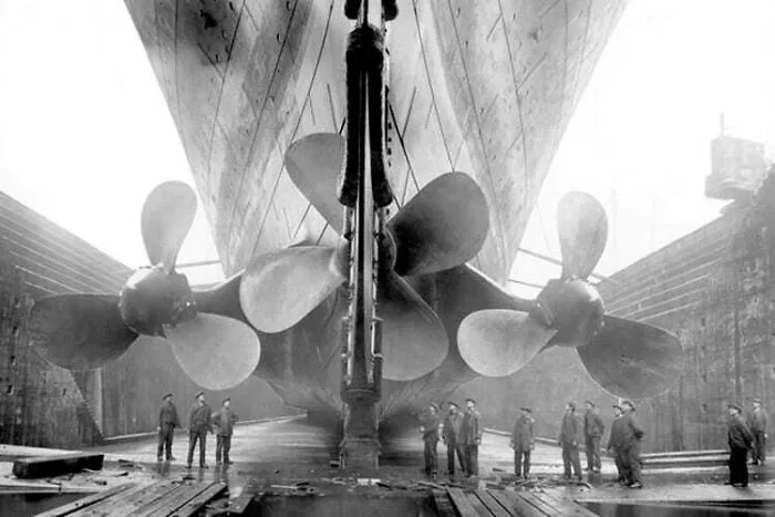 Three Huge Propellers Can Be Seen Below The Ship