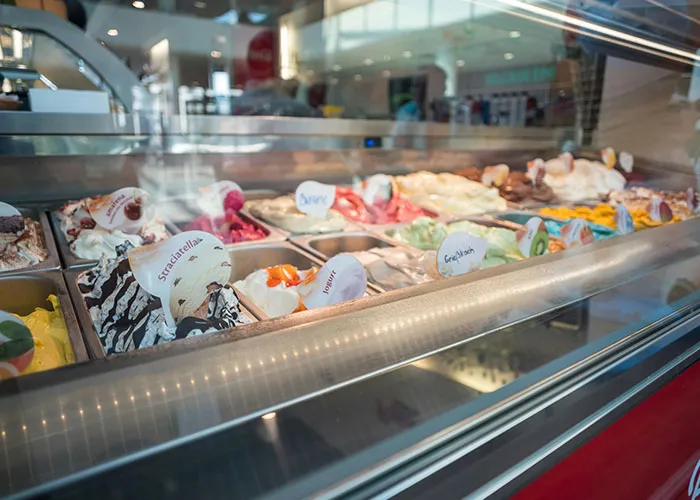 Gelato display in a shop showcasing various flavors as a visual metaphor for incredible coincidences that sound fake but are true.
