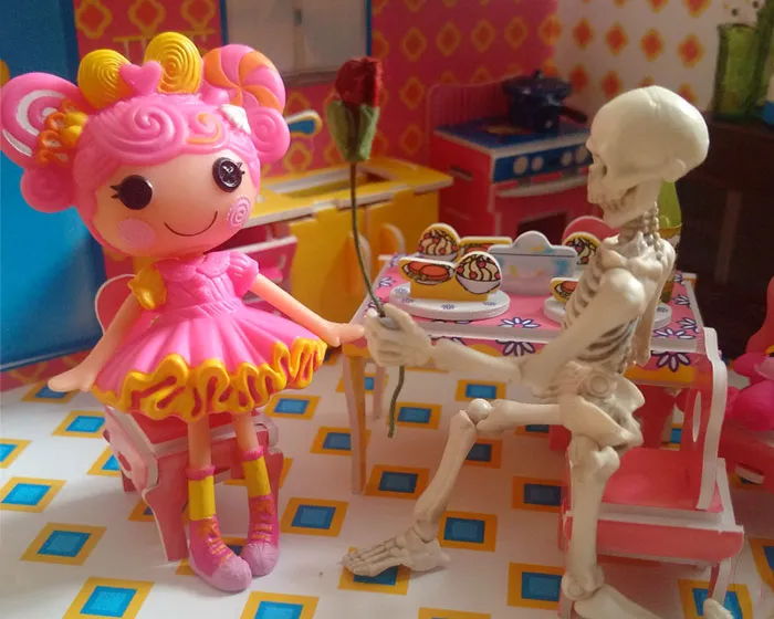 Colorful toy doll and skeleton figure in a whimsical room, illustrating bizarre and paranormal experiences concept.