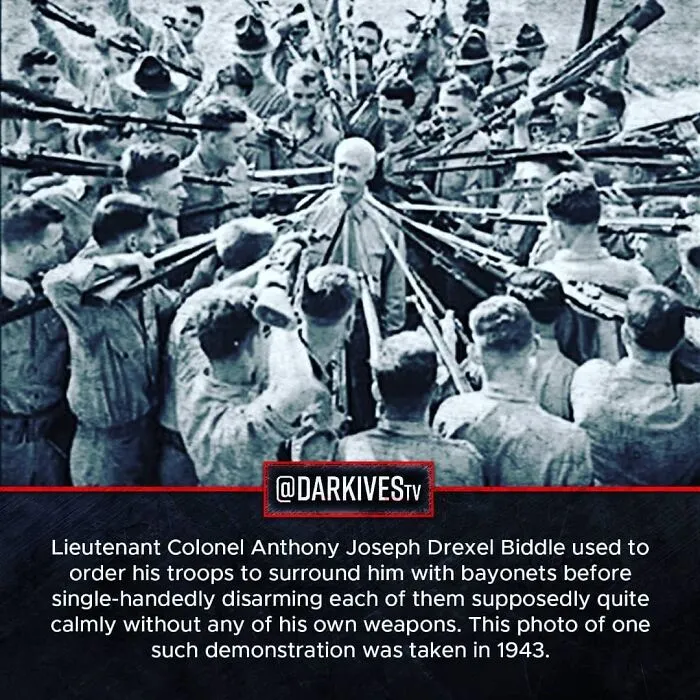 Lieutenant Colonel surrounded by troops with bayonets in 1943, showing strange and dark moments from history.