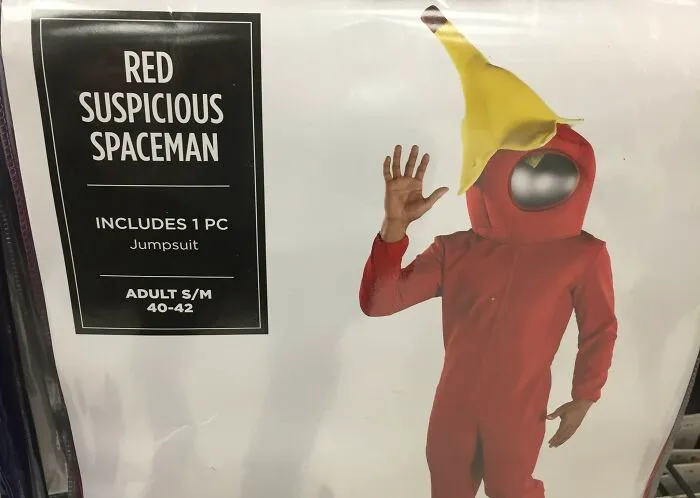 Off-brand Halloween costume of a red suspicious spaceman wearing a jumpsuit with a banana peel hat.