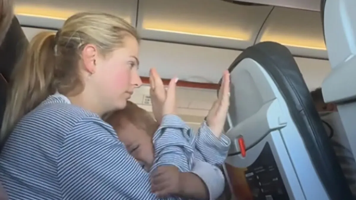 “Buy Another Seat”: Mom Sparks Outrage After Passenger Reclines Seat Into Her Lap
