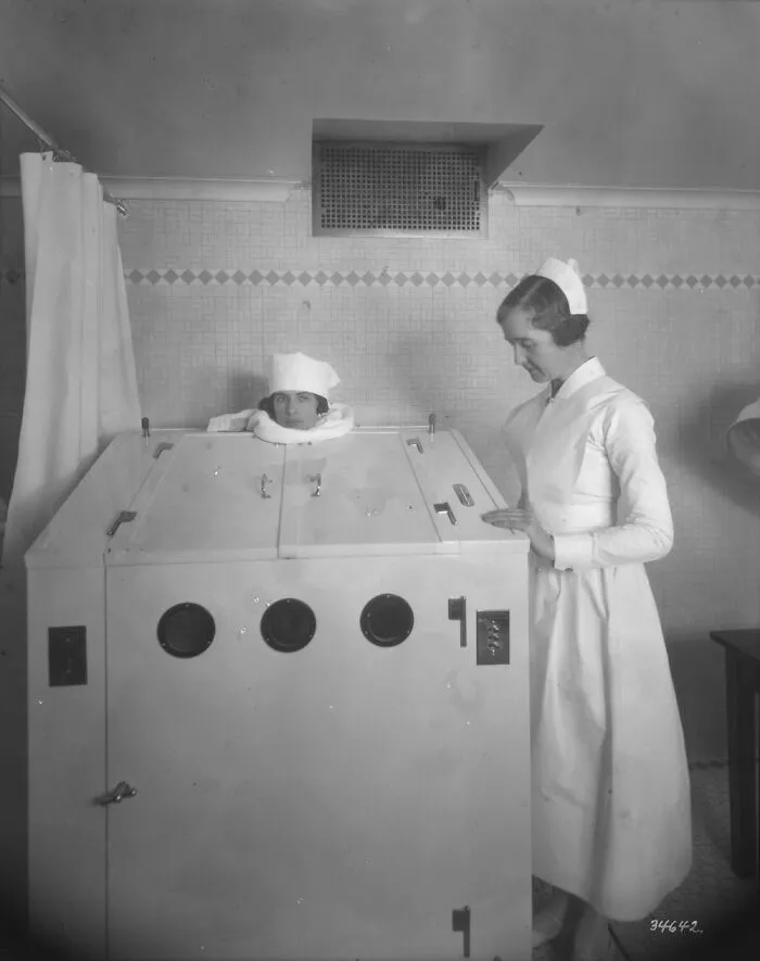 A Woman Gets Treated In An Electric Cabinet