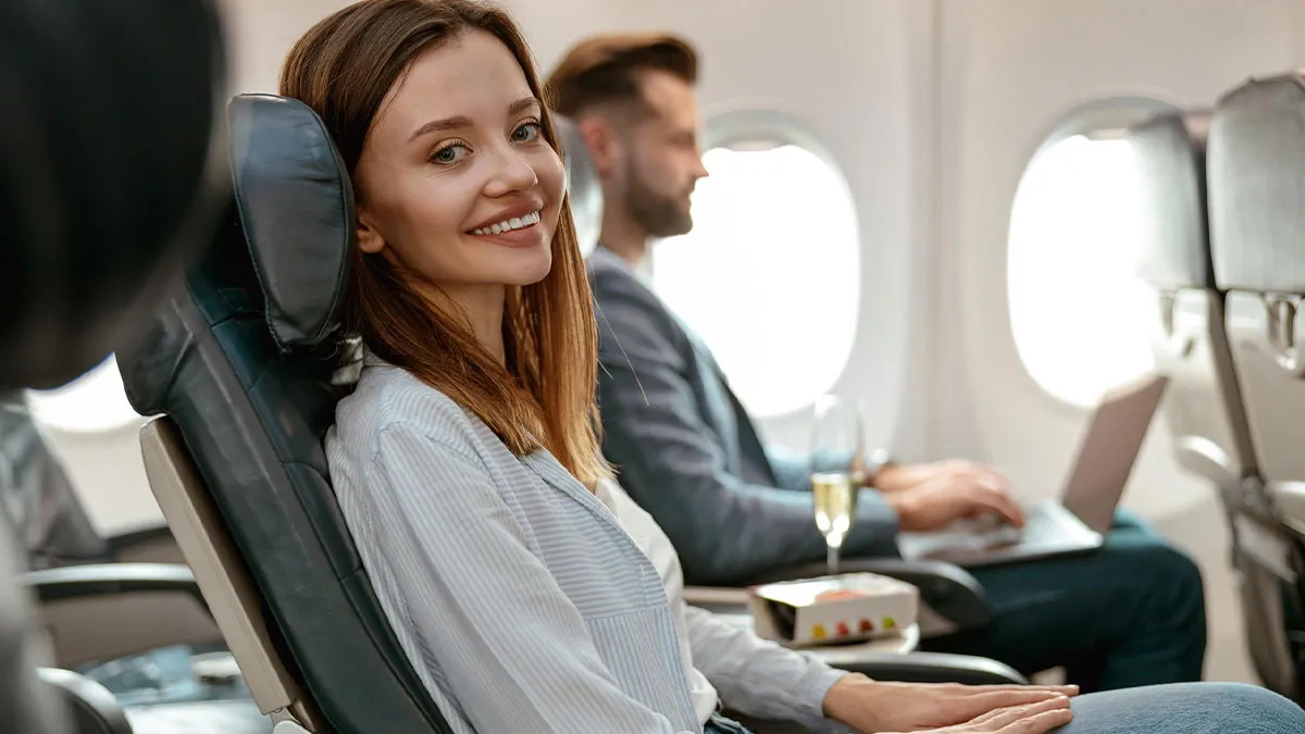 Woman Claps Back To A Rude Dude Trying To Ruin Her First-Class Flight By Any Means