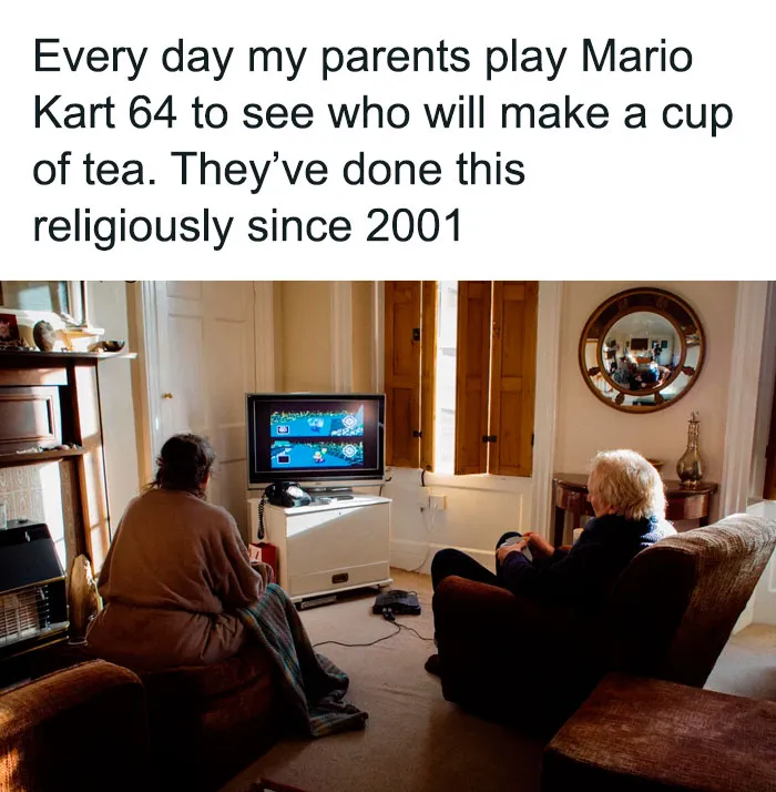 Elderly couple playing Mario Kart 64 at home, sharing a heartwarming moment from inspiring stories to cleanse negativity.