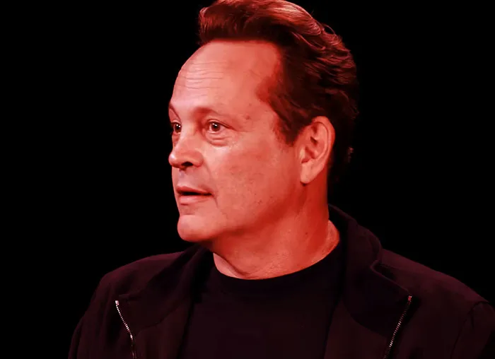 Man known by 73 people who knew celebrities before fame, wearing a black jacket against a dark background.