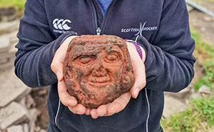 A Student Is Mid-Excavation In Orkney When A Carved Stone Head Simply Rolls Out Of The Ground