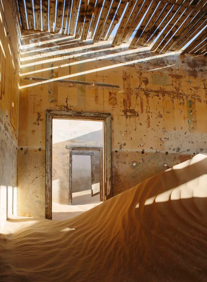 ‘Sand Castles’: 21 Surreal Photos Of Desert Sand Swallowing Abandoned Homes By Emma McEvoy