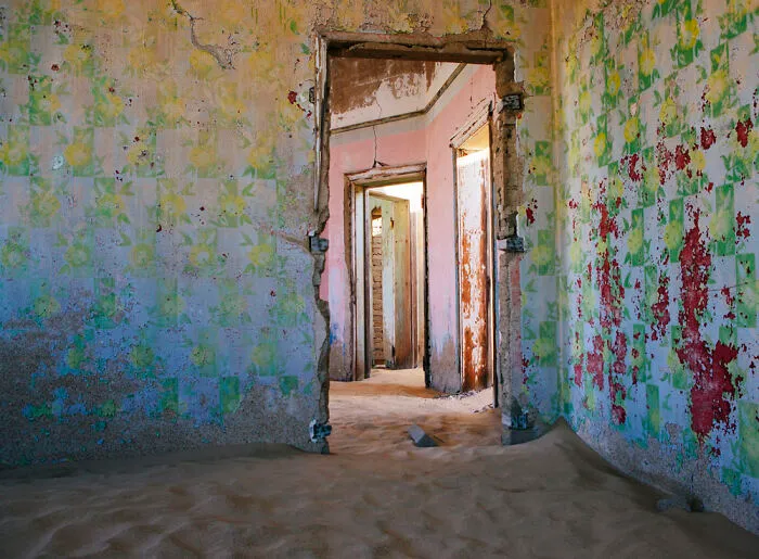 ‘Sand Castles’: 21 Surreal Photos Of Desert Sand Swallowing Abandoned Homes By Emma McEvoy