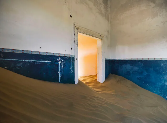 ‘Sand Castles’: 21 Surreal Photos Of Desert Sand Swallowing Abandoned Homes By Emma McEvoy