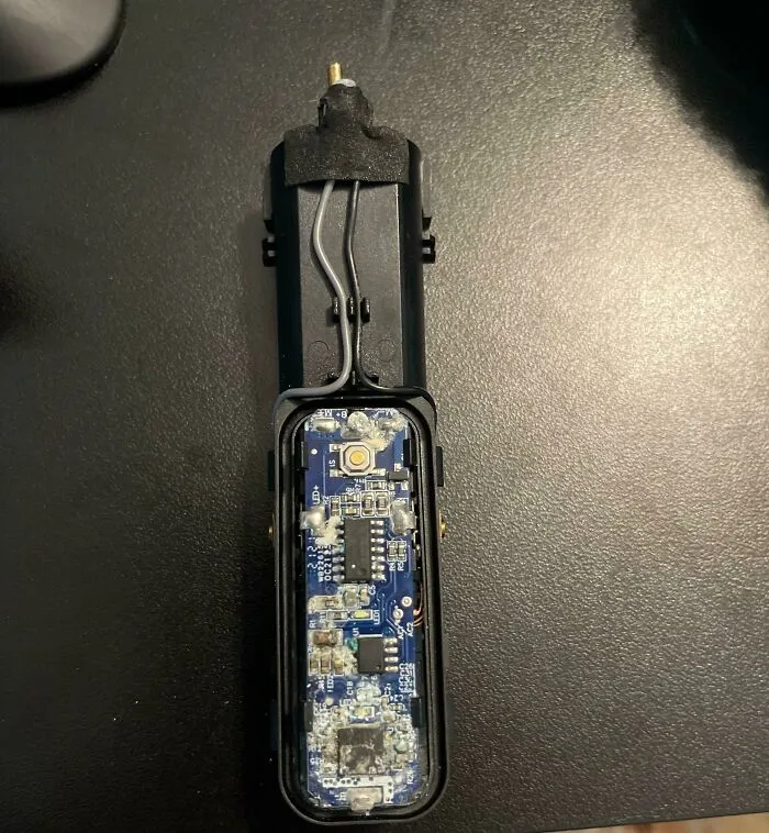 Damaged electronic device circuit board covered in corrosion, illustrating common mistakes in handling electronics and soldering.