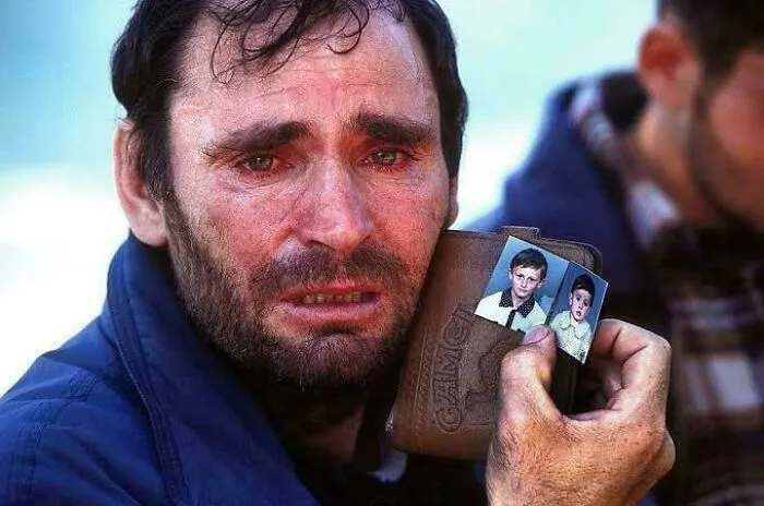 A Father Looking For His Two Missing Sons That Went Missing During The Kosovo War In 1999. (They Were Later Found Safe)