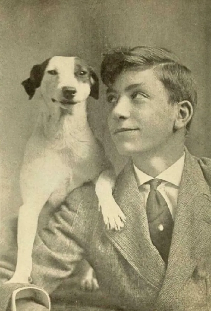 A Man With His Dog In The 1920s