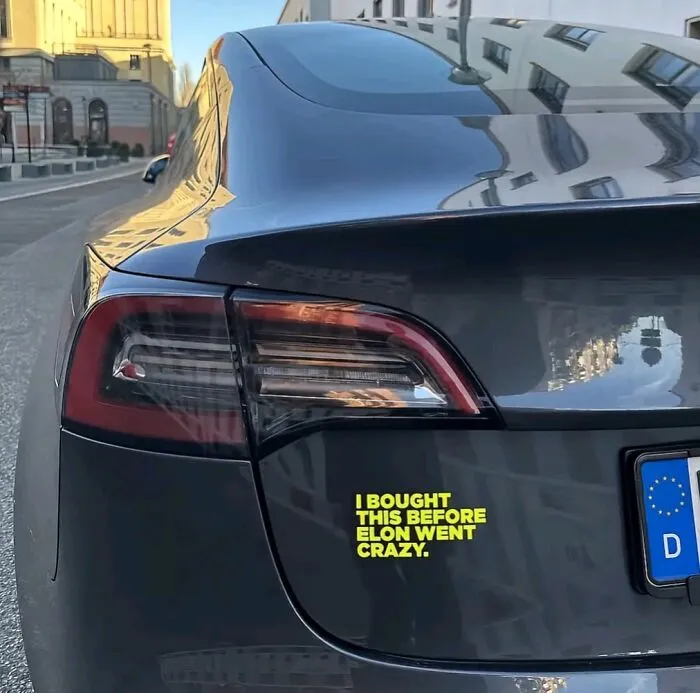 People Are Putting Regret Stickers On The Back Of Their Teslas