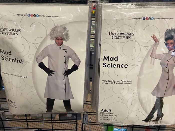 Two off-brand funny Halloween mad scientist costumes displayed in packaging in a store.