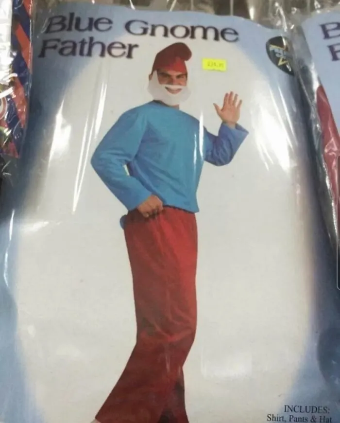 Man in off-brand Halloween costume labeled Blue Gnome Father, wearing blue shirt, red pants, red hat, and white beard.