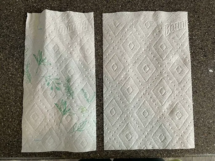New Bounty Paper Towel On The Left, Old Bounty On The Right. Both Packs Bought At Costco. Width Is Smaller & The Towel Itself Is Thinner