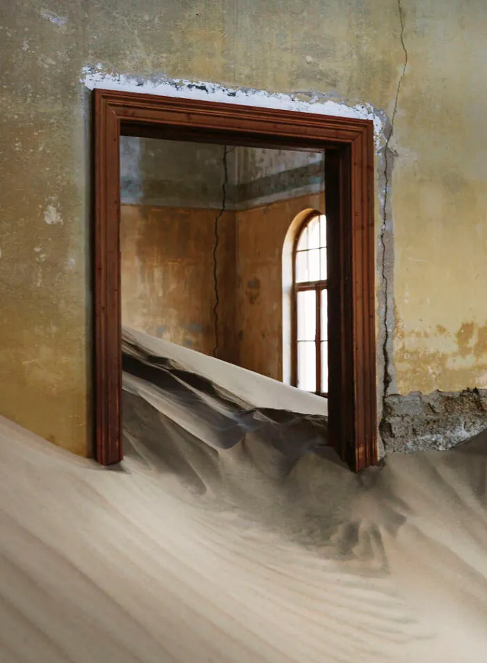 ‘Sand Castles’: 21 Surreal Photos Of Desert Sand Swallowing Abandoned Homes By Emma McEvoy