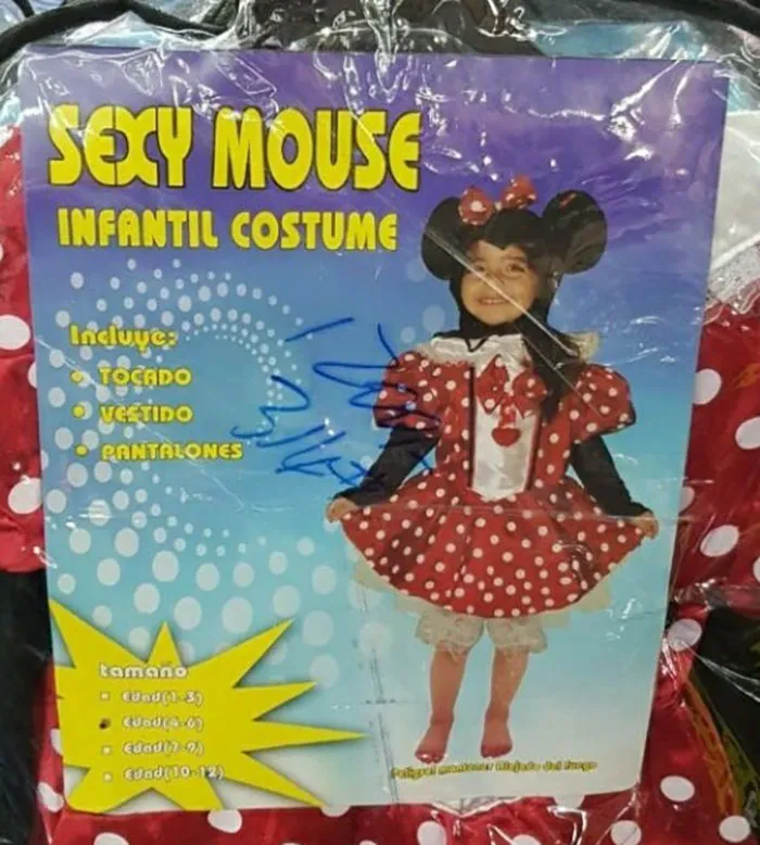 Child wearing off-brand Halloween costume resembling a polka-dotted mouse dress with oversized ears and bow headpiece.